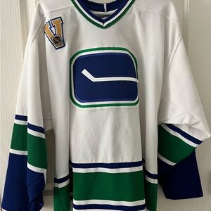 Men’s Large vintage Canuck jersey.